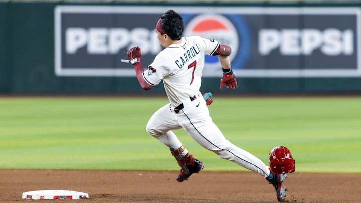 Aug 19, 2025; Phoenix, Arizona, USA; Arizona Diamondbacks outfielder Corbin Carroll loses his helmet as he runs the bases after hitting a triple in the fourth inning against the Cleveland Guardians at Chase Field. Mandatory Credit: Mark J. Rebilas-Imagn Images Aug 19, 2025; Phoenix, Arizona, USA; Arizona Diamondbacks outfielder Corbin Carroll loses his helmet as he runs the bases after hitting a triple in the fourth inning against the Cleveland Guardians at Chase Field. Mandatory Credit: Mark J. Rebilas-Imagn Images