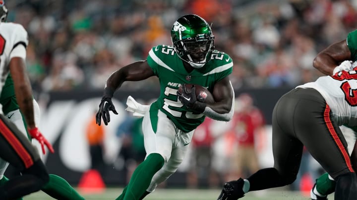 New York Jets running back Israel Abanikanda (25) rushes with the ball in the second half. The Buccaneers defeat the Jets, 13-6, in a preseason NFL game at MetLife Stadium on Saturday, Aug. 19, 2023, in East Rutherford.