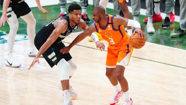 Jul 20, 2021; Milwaukee, Wisconsin, USA; Milwaukee Bucks forward Giannis Antetokounmpo (34) against Phoenix Suns guard Chris Paul (3) during game six of the 2021 NBA Finals at Fiserv Forum. Mandatory Credit: Mark J. Rebilas-Imagn Images Jul 20, 2021; Milwaukee, Wisconsin, USA; Milwaukee Bucks forward Giannis Antetokounmpo (34) against Phoenix Suns guard Chris Paul (3) during game six of the 2021 NBA Finals at Fiserv Forum. Mandatory Credit: Mark J. Rebilas-Imagn Images