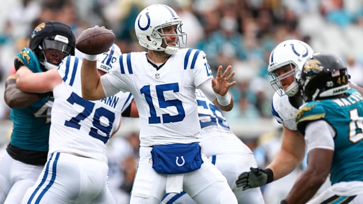 Oct 6, 2024; Jacksonville, Florida, USA; Indianapolis Colts quarterback Joe Flacco (15) drops back to pass against the Jacksonville Jaguars in the second quarter at EverBank Stadium. Mandatory Credit: Nathan Ray Seebeck-Imagn Images