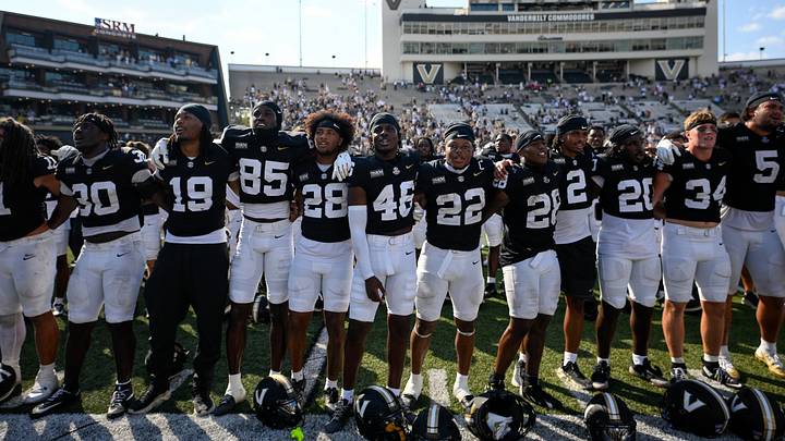 Sep 19, 2026; Nashville, Tennessee, USA; Vanderbilt Commodores stand in front of the band to celebrate the win against the NC State Wolfpack during the second half at FirstBank Stadium. Mandatory Credit: Steve Roberts-Imagn Images Sep 19, 2026; Nashville, Tennessee, USA; Vanderbilt Commodores stand in front of the band to celebrate the win against the NC State Wolfpack during the second half at FirstBank Stadium. Mandatory Credit: Steve Roberts-Imagn Images