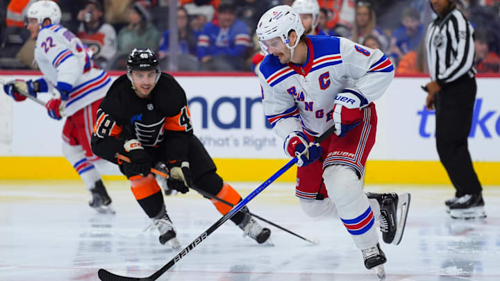 Nov 29, 2024; Philadelphia, Pennsylvania, USA; New York Rangers defenseman Jacob Trouba (8) controls the puck against the Philadelphia Flyers in the third period at Wells Fargo Center. Mandatory Credit: Kyle Ross-Imagn Images Nov 29, 2024; Philadelphia, Pennsylvania, USA; New York Rangers defenseman Jacob Trouba (8) controls the puck against the Philadelphia Flyers in the third period at Wells Fargo Center. Mandatory Credit: Kyle Ross-Imagn Images