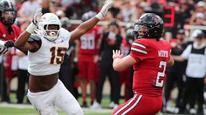 Sep 21, 2024; Lubbock, Texas, USA;  Arizona State Sun Devils defensive back Elijah O’Neal (15) pressures Texas Tech Red Raiders quarterback Behren Morton (2) in the first half at Jones AT&T Stadium and Cody Campbell Field. Mandatory Credit: Michael C. Johnson-Imagn Images