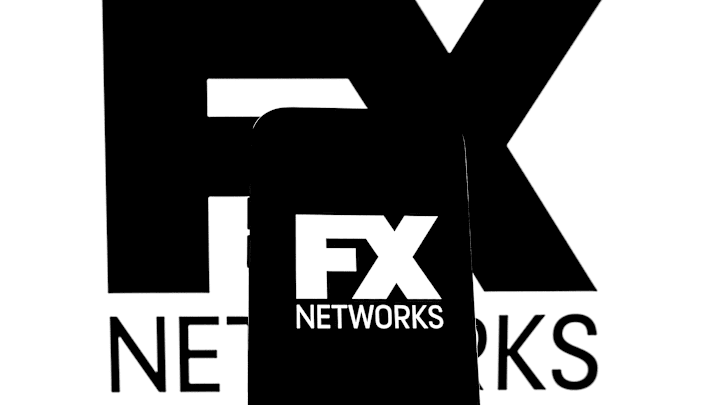 In this photo illustration a FX Networks logo seen displayed...