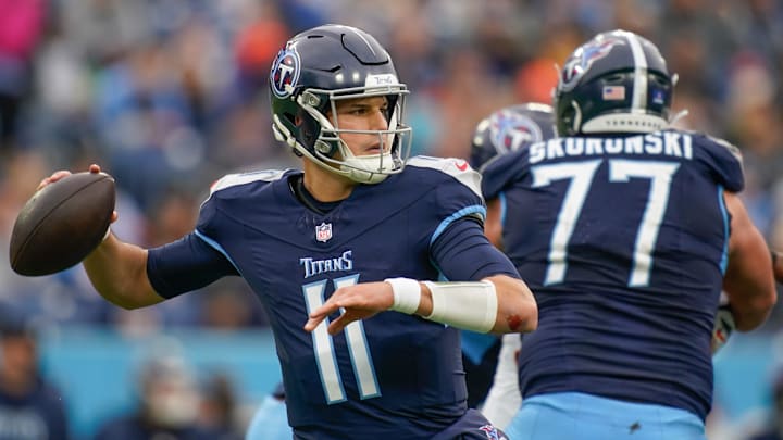 Tennessee Titans quarterback Mason Rudolph (11) looks for a receiver during the third quarter against the Cincinnati Bengals at Nissan Stadium in Nashville, Tenn., Sunday, Dec. 15, 2024.