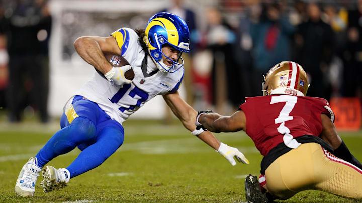 Los Angeles Rams wide receiver Puka Nacua (17) is tackled by San Francisco 49ers cornerback Charvarius Ward (7) after making a catch for a first down in the fourth quarter at Levi's Stadium. 