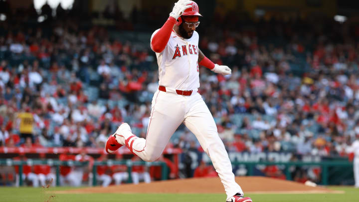 May 10, 2024; Anaheim, California, USA; Los Angeles Angels third base Niko Goodrum (28) reaches first base on an error during the second inning against the Kansas City Royals at Angel Stadium. Mandatory Credit: Kiyoshi Mio-USA TODAY Sports May 10, 2024; Anaheim, California, USA; Los Angeles Angels third base Niko Goodrum (28) reaches first base on an error during the second inning against the Kansas City Royals at Angel Stadium. Mandatory Credit: Kiyoshi Mio-USA TODAY Sports