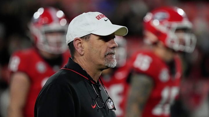 Georgia Offensive Coordinator Mike Bobo looks on during warm ups before the start of a NCAA college football game against Georgia Tech in Athens, Ga., on Friday, Nov. 29, 2024.