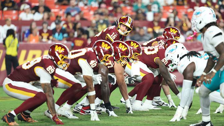 Aug 14, 2026; Landover, Maryland, USA; Washington Commanders quarterback Athan Kaliakmanis (16) prepares to take a snap during the second half against the Miami Dolphins at Northwest Stadium. Mandatory Credit: Amber Searls-Imagn Images