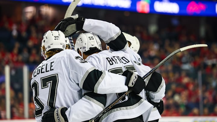 Jan 11, 2025; Calgary, Alberta, CAN; Los Angeles Kings defenseman Jacob Moverare (43) celebrates his goal with teammates against the Calgary Flames during the first period at Scotiabank Saddledome. Mandatory Credit: Sergei Belski-Imagn Images