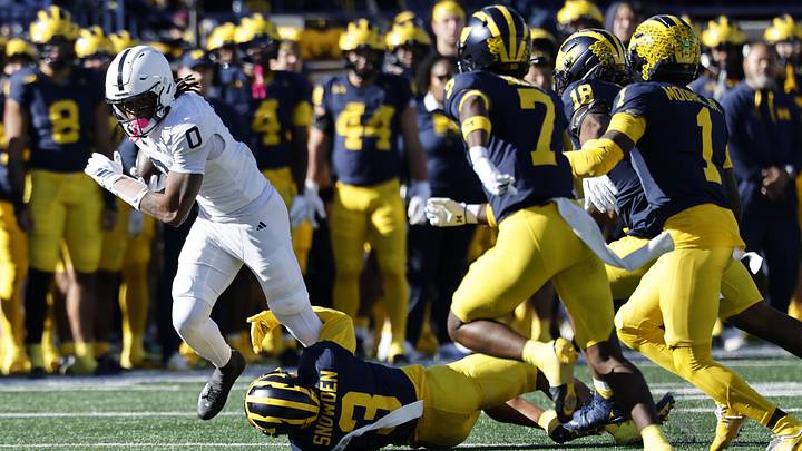 Penn State Nittany Lions wide receiver Chase Sowell (0) runs with the ball against the Michigan Wolverines in the first quarter at Michigan Stadium. 