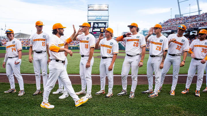 Jun 22, 2024; Omaha, NE, USA; Tennessee Volunteers head coach Tony Vitello high fives players before a game against the Texas A&M Aggies at Charles Schwab Field Omaha. Mandatory Credit: Dylan Widger-Imagn Images Jun 22, 2024; Omaha, NE, USA; Tennessee Volunteers head coach Tony Vitello high fives players before a game against the Texas A&M Aggies at Charles Schwab Field Omaha. Mandatory Credit: Dylan Widger-Imagn Images