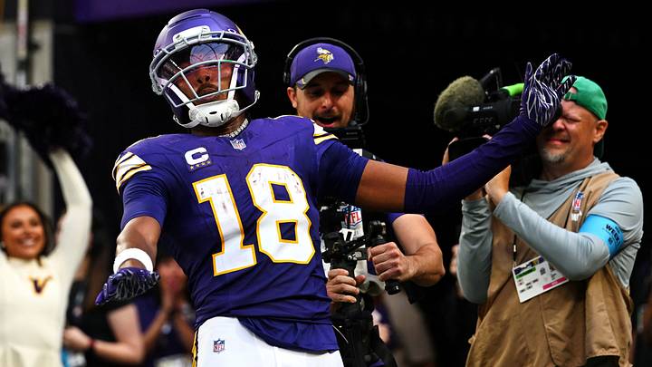 Minnesota Vikings wide receiver Justin Jefferson (18) celebrates after a touchdown during the second half against the Green Bay Packers at U.S. Bank Stadium. Mandatory Credit: Jeffrey Becker-Imagn Images Minnesota Vikings wide receiver Justin Jefferson (18) celebrates after a touchdown during the second half against the Green Bay Packers at U.S. Bank Stadium. Mandatory Credit: Jeffrey Becker-Imagn Images