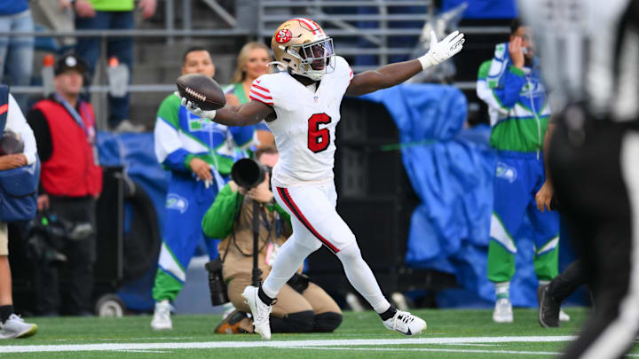 Oct 10, 2024; Seattle, Washington, USA; San Francisco 49ers safety Malik Mustapha (6) celebrates after intercepting the ball against the Seattle Seahawks during the first half at Lumen Field. Mandatory Credit: Steven Bisig-Imagn Images