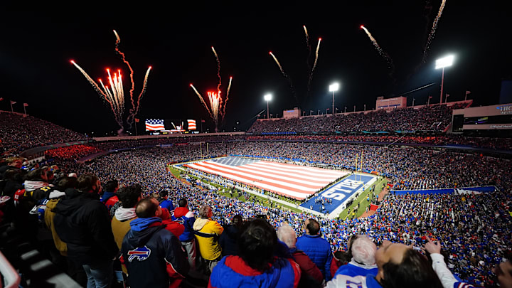 Nov 13, 2023; Orchard Park, New York, USA; The Buffalo Bills display a field wide flag to show appreciation for Veterans Day during the National Anthem prior to the game against the Denver Broncos at Highmark Stadium. Mandatory Credit: Gregory Fisher-Imagn Images
