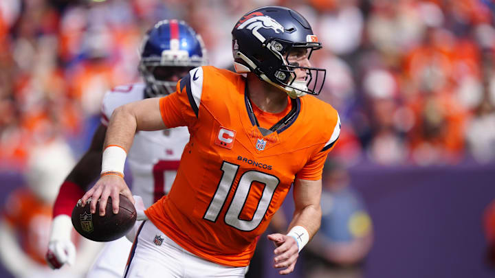 Oct 19, 2025; Denver, Colorado, USA; Denver Broncos quarterback Bo Nix (10) runs the ball during the first half against the New York Giants at Empower Field at Mile High. Mandatory Credit: Ron Chenoy-Imagn Images Oct 19, 2025; Denver, Colorado, USA; Denver Broncos quarterback Bo Nix (10) runs the ball during the first half against the New York Giants at Empower Field at Mile High. Mandatory Credit: Ron Chenoy-Imagn Images