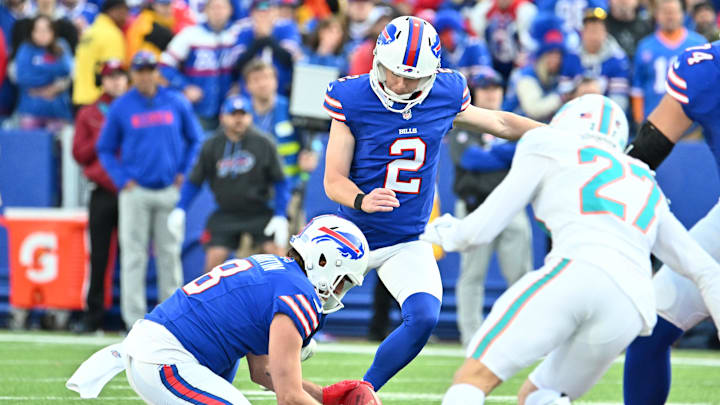 Nov 3, 2024; Orchard Park, New York, USA; Buffalo Bills placekicker Tyler Bass (2) kicks a 61-yard field goal to take the lead over the Miami Dolphins in the fourth quarter at Highmark Stadium. 