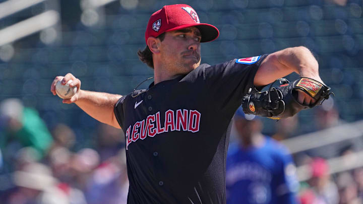Mar 2, 2024; Goodyear, Arizona, USA; Cleveland Guardians starting pitcher Shane Bieber (57) pitches against the Kansas City Royals during the first inning at Goodyear Ballpark