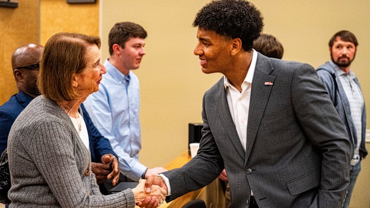 Ole Miss quarterback Trinidad Chambliss shakes hands with a supporter after the hearing of Chambliss in his lawsuit against the NCAA at Calhoun County Courthouse in Pittsboro, Miss., on Thursday, Feb. 12, 2026. Chambliss was granted a preliminary injunction against the NCAA.