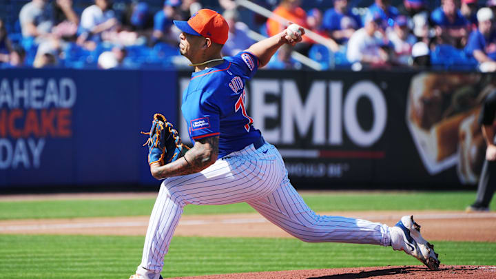 Feb 25, 2024; Port St. Lucie, Florida, USA;  New York Mets starting pitcher Jose Butto (70) pitches from the mound.