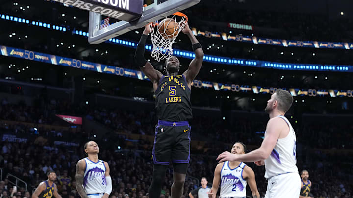 Nov 18, 2025; Los Angeles, California, USA; Los Angeles Lakers center Deandre Ayton (5) dunks the ball against the Utah Jazz in the second quarter at Crypto.com Arena. Mandatory Credit: Kirby Lee-Imagn Images Nov 18, 2025; Los Angeles, California, USA; Los Angeles Lakers center Deandre Ayton (5) dunks the ball against the Utah Jazz in the second quarter at Crypto.com Arena. Mandatory Credit: Kirby Lee-Imagn Images