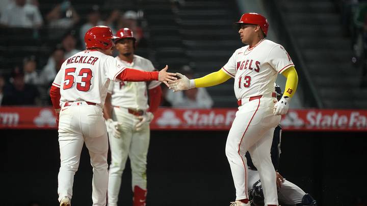 Sep 2, 2026; Anaheim, California, USA; Los Angeles Angels designated hitter Moises Ballesteros (13) is congratulated by left fielder Wade Meckler (53) after hitting a two-run home run in the 10th inning against the New York Yankees at Angel Stadium. Mandatory Credit: Kirby Lee-Imagn Images