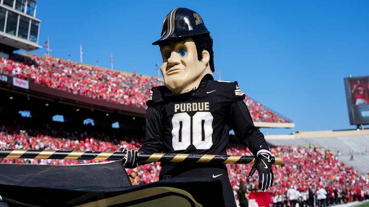 Oct 5, 2024; Madison, Wisconsin, USA; Purdue Boilermakers mascot Purdue Pete holds a Purdue flag prior to the game against the Wisconsin Badgers at Camp Randall Stadium. Oct 5, 2024; Madison, Wisconsin, USA; Purdue Boilermakers mascot Purdue Pete holds a Purdue flag prior to the game against the Wisconsin Badgers at Camp Randall Stadium.