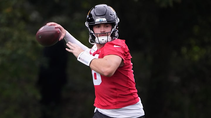 Oct 16, 2024; Watford, United Kingdom; Jacksonville Jaguars quarterback John Rhys Plumlee (18) throws the ball during practice at The Grove. Mandatory Credit: Kirby Lee-Imagn Images