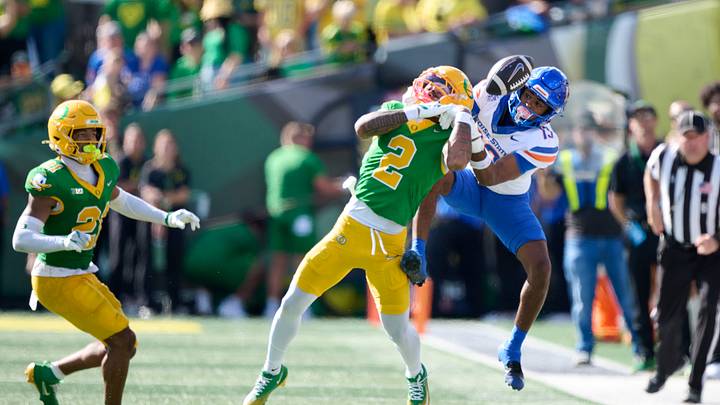 Sep 5, 2026; Eugene, Oregon, USA; Oregon Ducks defensive back Na'eem Offord (2) breaks up a pass play during the second half against Boise State Broncos wide receiver Darren Morris (13) at Autzen Stadium. Mandatory Credit: Troy Wayrynen-Imagn Images