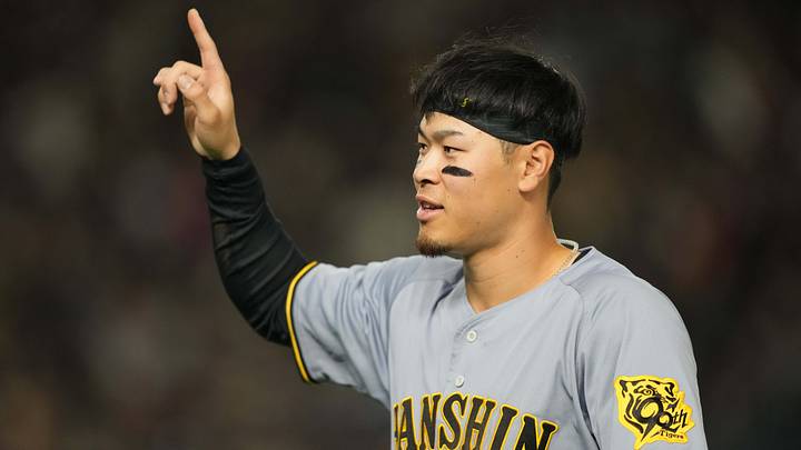 Mar 15, 2025; Bunkyo, Tokyo, Japan; Hanshin Tigers right fielder Teruaki Sato (8) gestures during the fifth inning against the Chicago Cubs at Tokyo Dome. Mandatory Credit: Darren Yamashita-Imagn Images Mar 15, 2025; Bunkyo, Tokyo, Japan; Hanshin Tigers right fielder Teruaki Sato (8) gestures during the fifth inning against the Chicago Cubs at Tokyo Dome. Mandatory Credit: Darren Yamashita-Imagn Images