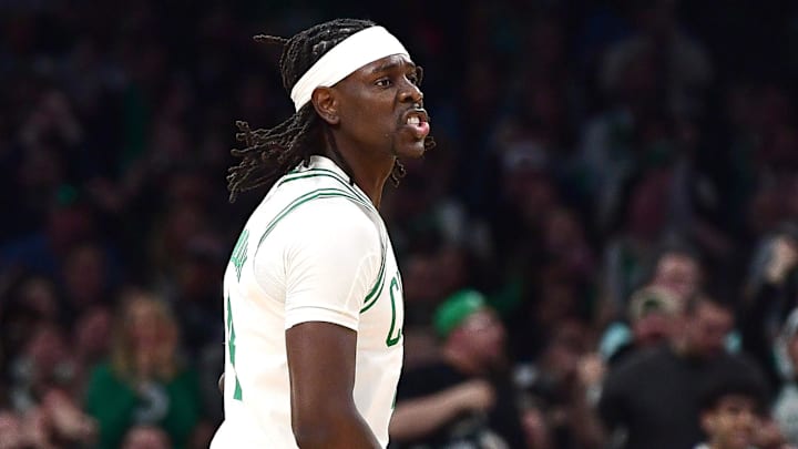 Apr 20, 2025; Boston, Massachusetts, USA; Boston Celtics guard Jrue Holiday (4) reacts after a three point basket during the second half against the Orlando Magic at TD Garden. Mandatory Credit: Bob DeChiara-Imagn Images