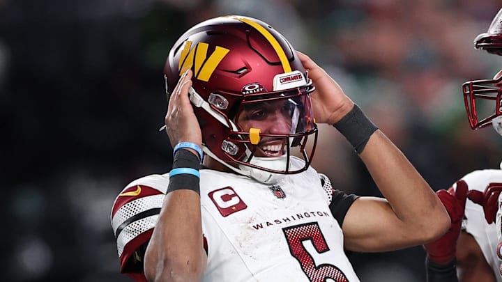 Jan 26, 2025; Philadelphia, PA, USA; Washington Commanders quarterback Jayden Daniels (5) celebrates after a play against the Philadelphia Eagles during the second half in the NFC Championship game at Lincoln Financial Field. Mandatory Credit: Bill Streicher-Imagn Images