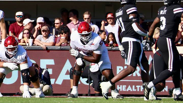 Oklahoma offensive lineman Michael Fasusi prepares for a snap against Mississippi State. Oklahoma offensive lineman Michael Fasusi prepares for a snap against Mississippi State.