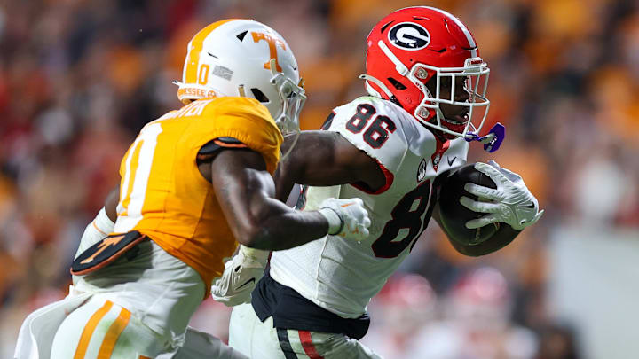 Nov 18, 2023; Knoxville, Tennessee, USA; Georgia Bulldogs wide receiver Dillon Bell (86) runs the ball against the Tennessee Volunteers during the second half at Neyland Stadium. Mandatory Credit: Randy Sartin-Imagn Images