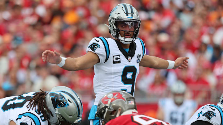 Dec 29, 2024; Tampa, Florida, USA; Carolina Panthers quarterback Bryce Young (9) calls a play against the Tampa Bay Buccaneers during the first quarter at Raymond James Stadium.