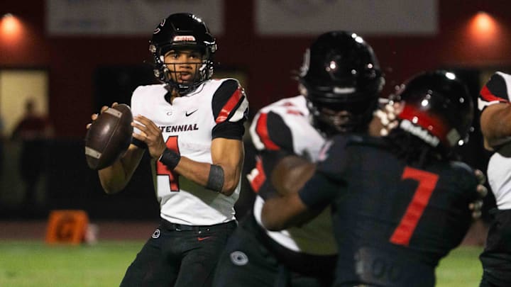 Centennial Huskies Quarterback Husan Longstreet (4) prepares to pass the ball at Liberty High School on Sept. 21, 2024, in Peoria. Centennial Huskies Quarterback Husan Longstreet (4) prepares to pass the ball at Liberty High School on Sept. 21, 2024, in Peoria.