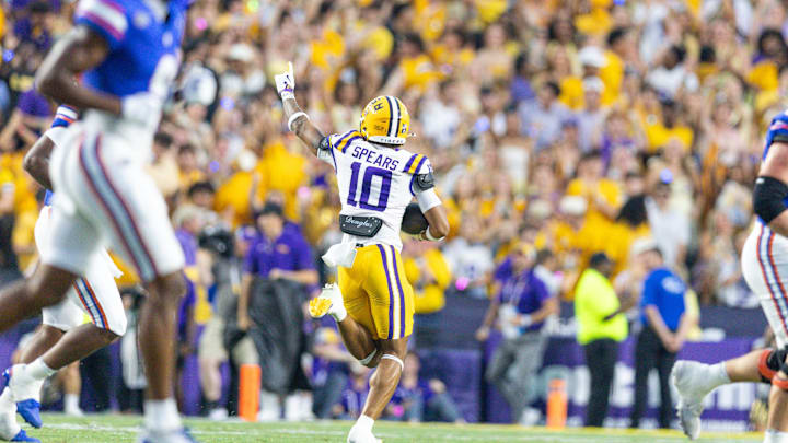 Sep 13, 2025; Baton Rouge, Louisiana, USA; LSU Tigers safety Dashawn Spears (10) intercepts the ball from Florida Gators quarterback DJ Lagway (not pictured) during the first half at Tiger Stadium. Mandatory Credit: Stephen Lew-Imagn Images Sep 13, 2025; Baton Rouge, Louisiana, USA; LSU Tigers safety Dashawn Spears (10) intercepts the ball from Florida Gators quarterback DJ Lagway (not pictured) during the first half at Tiger Stadium. Mandatory Credit: Stephen Lew-Imagn Images