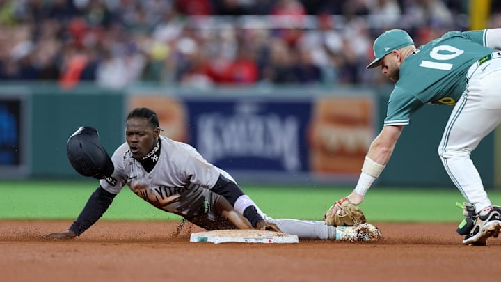 Sep 12, 2025; Boston, Massachusetts, USA; New York Yankees second baseman Jazz Chisholm Jr (13) steals second base during the eighth inning against the Boston Red Sox at Fenway Park. Mandatory Credit: Paul Rutherford-Imagn Images Sep 12, 2025; Boston, Massachusetts, USA; New York Yankees second baseman Jazz Chisholm Jr (13) steals second base during the eighth inning against the Boston Red Sox at Fenway Park. Mandatory Credit: Paul Rutherford-Imagn Images