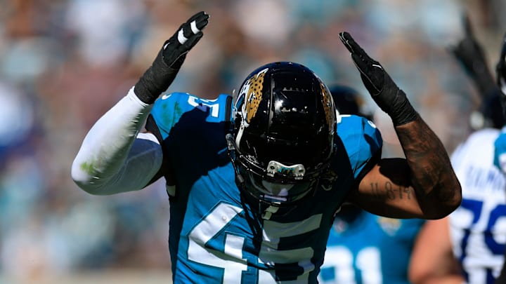 Jacksonville Jaguars linebacker K'Lavon Chaisson (45) gets fired up and slaps his helmet after a tackle on Indianapolis Colts quarterback Gardner Minshew (10), not shown, during the third quarter of an NFL football matchup Sunday, Oct. 15, 2023 at EverBank Stadium in Jacksonville, Fla. The Jacksonville Jaguars defeated the Indianapolis Colts 37-20. [Corey Perrine/Florida Times-Union]