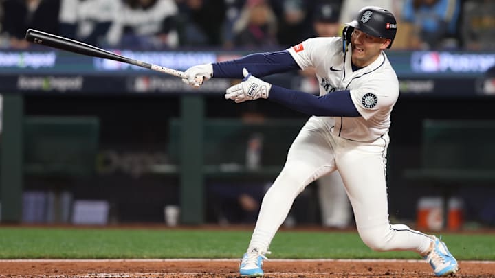 Oct 16, 2025; Seattle, Washington, USA; Seattle Mariners designated hitter Dominic Canzone (8) singles in the fifth inning against the Toronto Blue Jays during game four of the ALCS round for the 2025 MLB playoffs at T-Mobile Park. Mandatory Credit: Kevin Ng-Imagn Images Oct 16, 2025; Seattle, Washington, USA; Seattle Mariners designated hitter Dominic Canzone (8) singles in the fifth inning against the Toronto Blue Jays during game four of the ALCS round for the 2025 MLB playoffs at T-Mobile Park. Mandatory Credit: Kevin Ng-Imagn Images