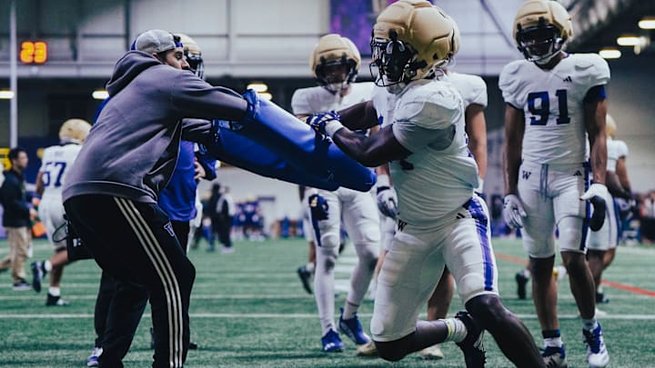 Milton Hopkins Jr. takes part in an edge rusher drill in spring ball. Milton Hopkins Jr. takes part in an edge rusher drill in spring ball.