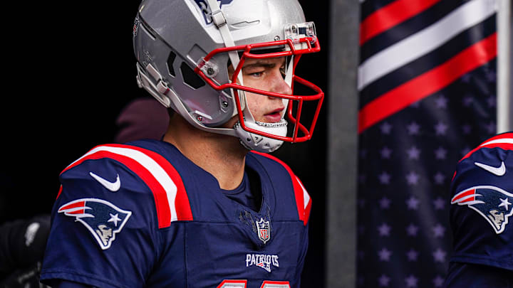 New England Patriots quarterback Drake Maye (10) walks to the field to warm up before the start of the game against the Buffalo Bills at Gillette Stadium.