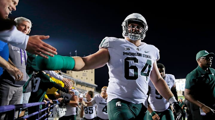 Sep 3, 2021; Evanston, Illinois, USA; Michigan State Spartans offensive lineman Matt Allen (64) celebrates their win over the Northwestern Wildcats at Ryan Field. The Michigan State Spartans won 38-21. Mandatory Credit: Jon Durr-Imagn Images