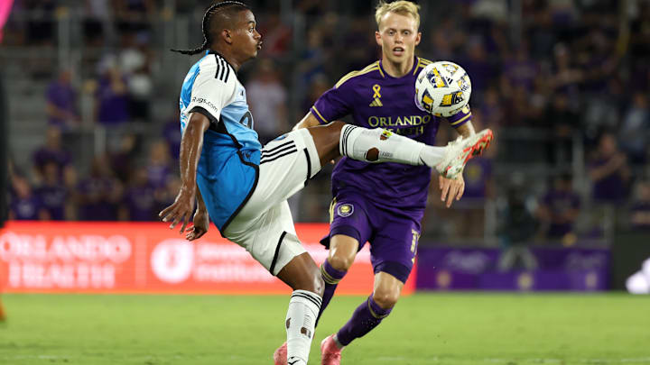Sep 18, 2024; Orlando, Florida, USA; Charlotte FC forward Kerwin Vargas (18) controls the ball as Orlando City midfielder Dagur Thorhallsson (17) attempts to defend during the first half at Inter&Co Stadium. Mandatory Credit: Kim Klement Neitzel-Imagn Images