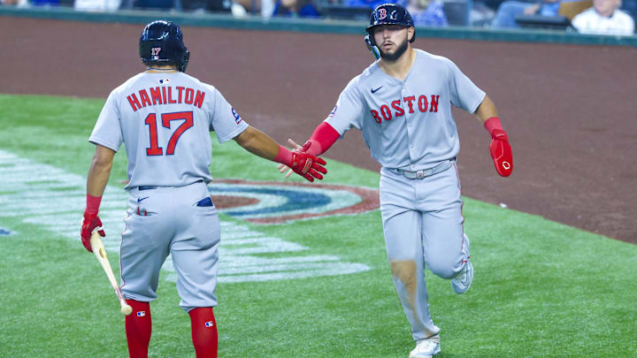 Mar 30, 2025; Arlington, Texas, USA; Boston Red Sox right fielder Wilyer Abreu (52) celebrates with Boston Red Sox shortstop David Hamilton (17) after scoring during the sixth inning against the Texas Rangers at Globe Life Field. Mandatory Credit: Kevin Jairaj-Imagn Images