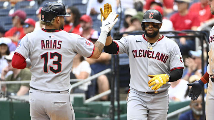 May 7, 2025; Washington, District of Columbia, USA; Cleveland Guardians second baseman Gabriel Arias (13) and first baseman Carlos Santana (41) celebrate after both scored during the sixth inning against the Washington Nationals at Nationals Park. Mandatory Credit: Brad Mills-Imagn Images May 7, 2025; Washington, District of Columbia, USA; Cleveland Guardians second baseman Gabriel Arias (13) and first baseman Carlos Santana (41) celebrate after both scored during the sixth inning against the Washington Nationals at Nationals Park. Mandatory Credit: Brad Mills-Imagn Images