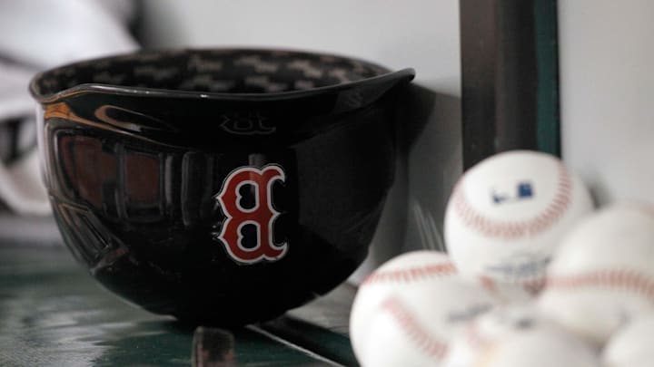May 24, 2014; St. Petersburg, FL, USA; Boston Red Sox helmet lays in the dugout against the Tampa Bay Rays at Tropicana Field. Mandatory Credit: Kim Klement-Imagn Images