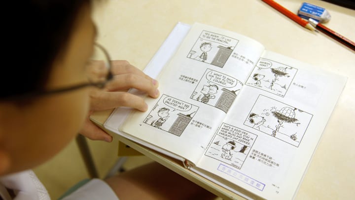 A 4th grade student reads during class at La Salle Primary...