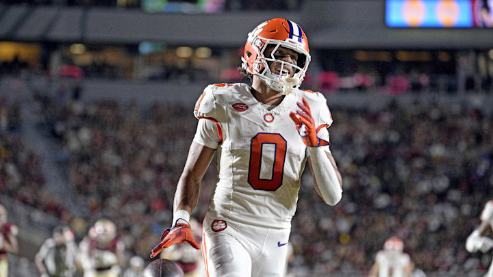 Oct 5, 2024; Tallahassee, Florida, USA; Clemson Tigers wide receiver Antonio Williams (0) scores a touchdown against the Florida State Seminoles during the first half at Doak S. Campbell Stadium. 