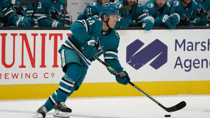 Jan 27, 2025; San Jose, California, USA;  San Jose Sharks center Mikael Granlund (64) looks to pass the puck in the first period against the Pittsburgh Penguins at SAP Center at San Jose. Mandatory Credit: David Gonzales-Imagn Images